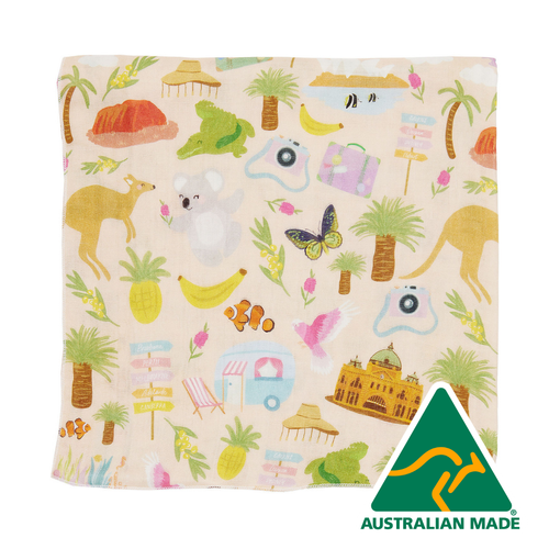 Fabric with colorful patterns of animals, objects, and landmarks on a beige background, featuring an Australian Made logo.