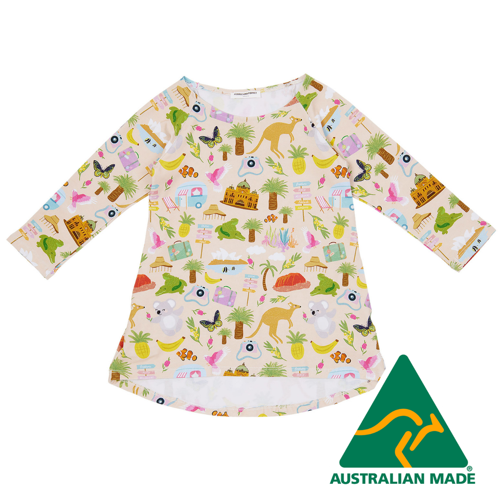 Children's dress with a colorful pattern of animals and vehicles, Australian Made logo visible