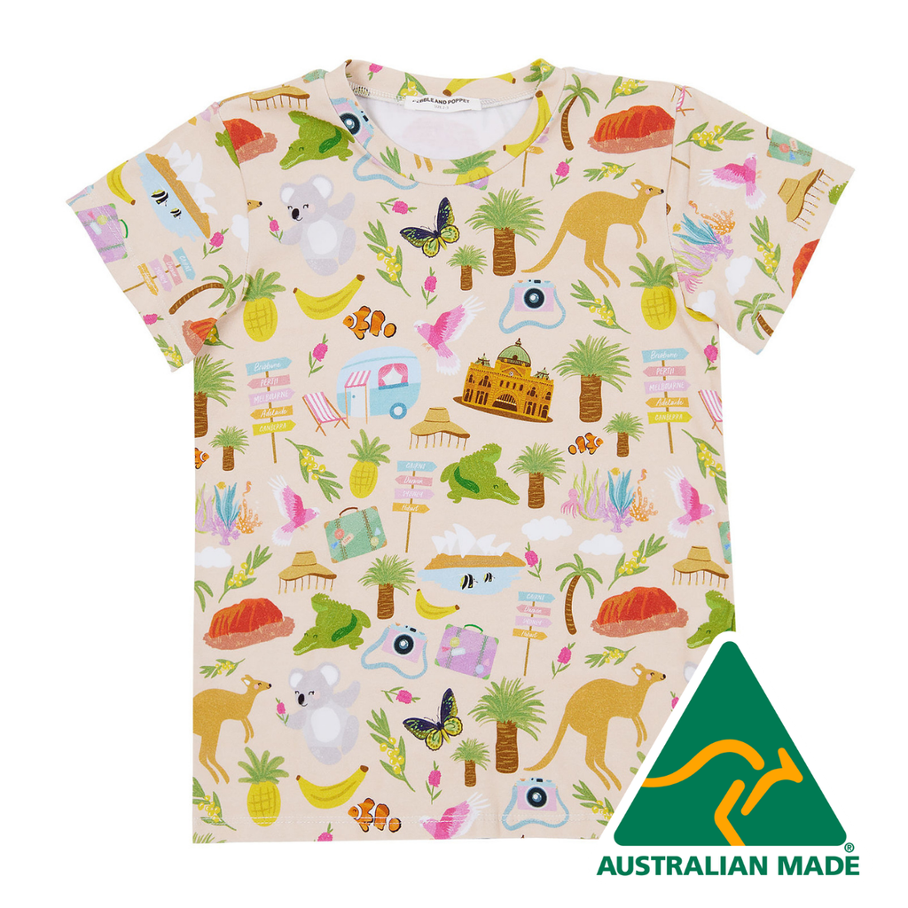 Colorful t-shirt with a tropical pattern featuring animals and objects, Australian Made logo visible.