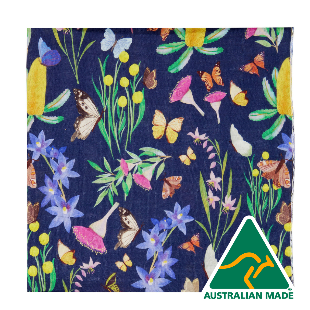 Festive fabric with colorful flowers and butterflies on a blue background, featuring 'Australian Made' logo.