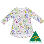 Children's dress with floral and butterfly pattern on a white background, Australian Made logo visible.