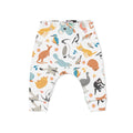 Children's pants with a print of various animals, including kangaroos, koalas, and birds, in a multicolored design on a white background.