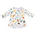 A long-sleeved girls' dress with a printed design featuring various cartoon animals and birds.