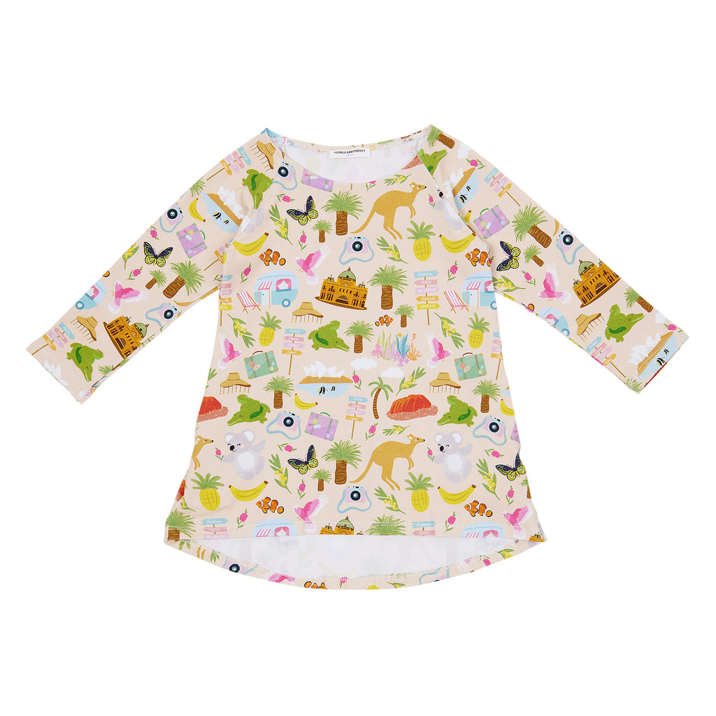 Aussie Road Trip organic cotton girls dress featuring Australian landmarks, koalas, kangaroos, caravans, palm trees and road trip illustrations on a soft blush background.