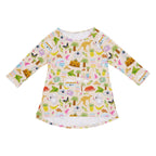Aussie Road Trip organic cotton girls dress featuring Australian landmarks, koalas, kangaroos, caravans, palm trees and road trip illustrations on a soft blush background.