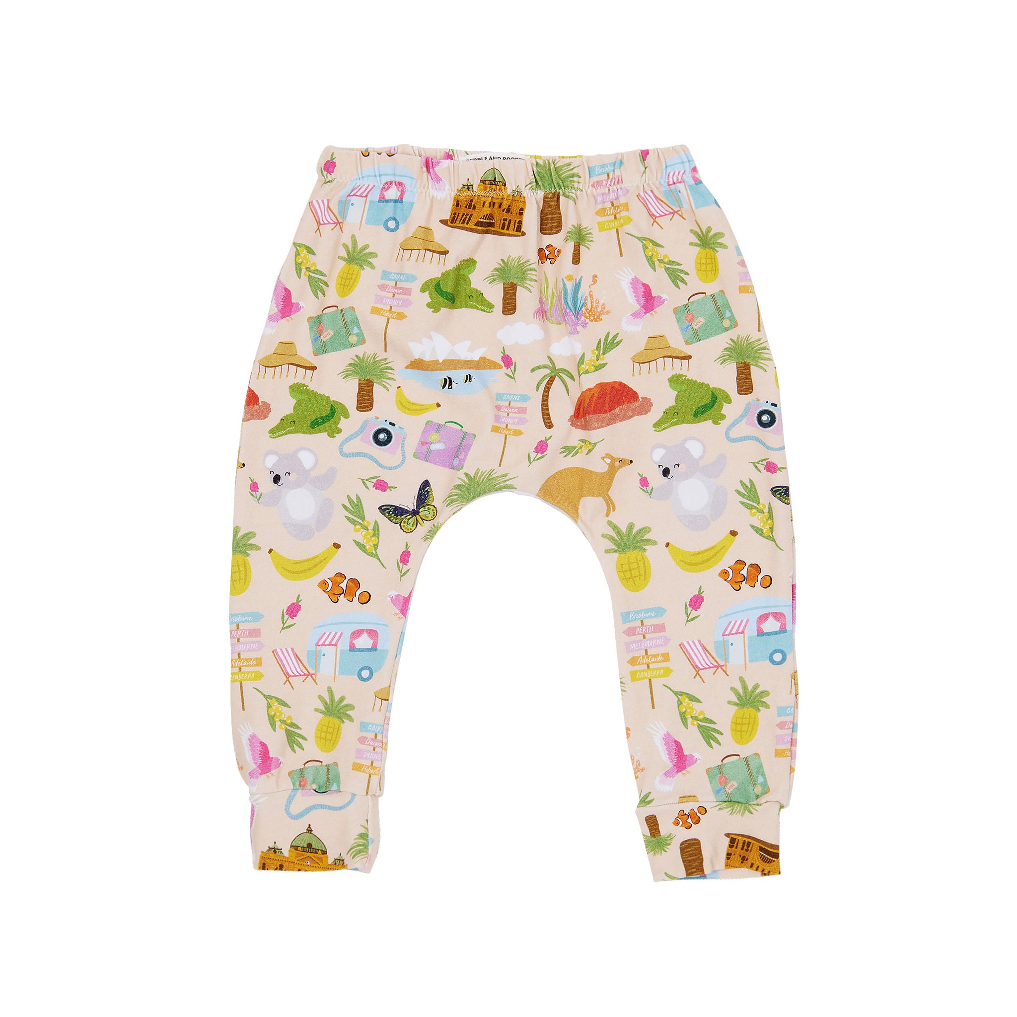 Aussie Road Trip organic cotton kids pants featuring playful Australian illustrations including kangaroos, koalas, caravans, cameras and tropical holiday icons on a soft beige background.