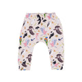 Backyard Birds baby pants featuring Australian native bird illustrations including cockatoos, galahs, magpies and lorikeets on a soft blush pink background by Pebble and Poppet.