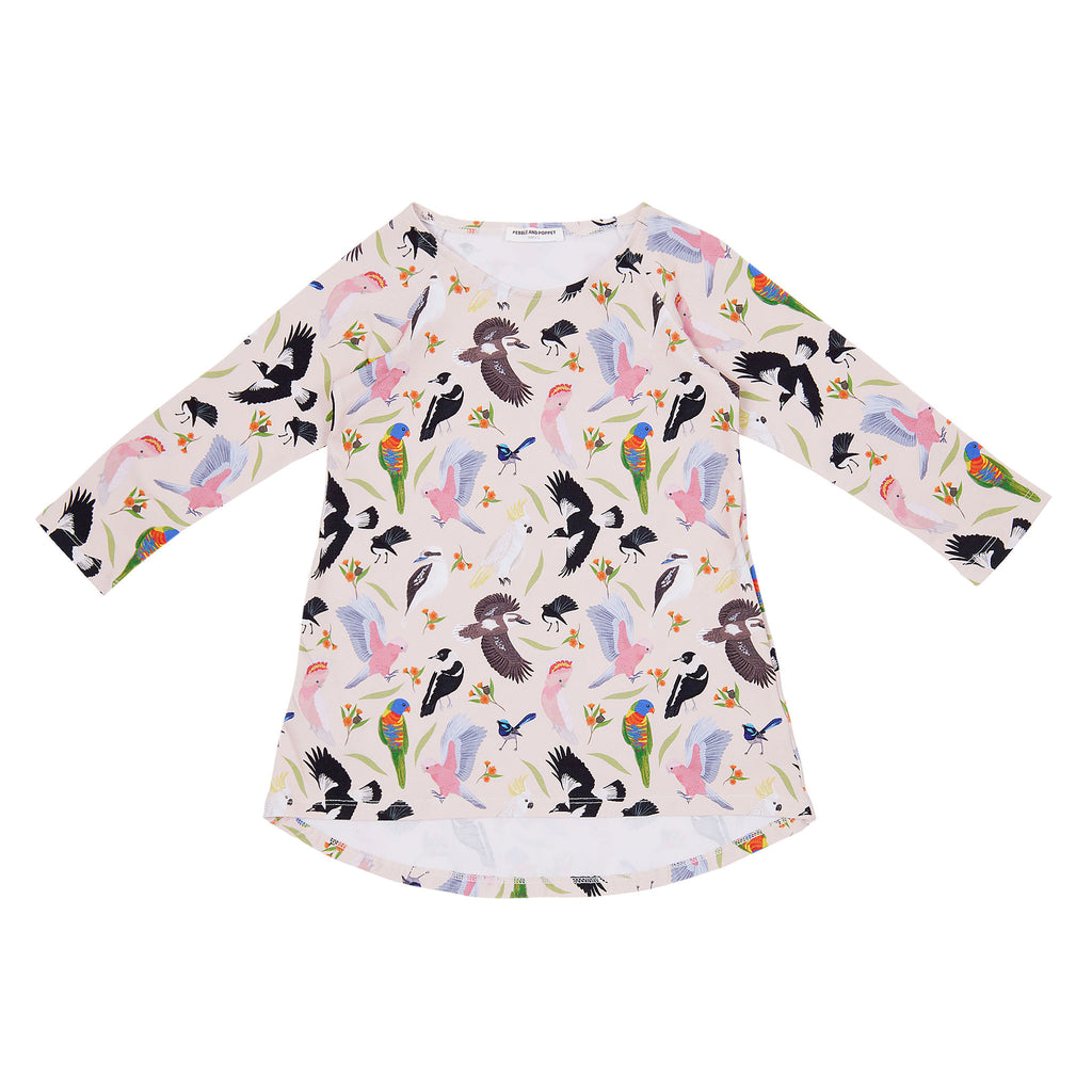 Backyard Birds organic cotton girls dress featuring colourful Australian native birds including rosellas, cockatoos, magpies and wrens with native florals on a soft blush pink background.