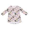 Backyard Birds organic cotton girls dress featuring colourful Australian native birds including rosellas, cockatoos, magpies and wrens with native florals on a soft blush pink background.