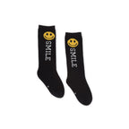 Black socks with smiley face and 'SMILE' text on a white background