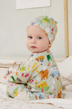Baby wearing Summer Down Under adventure romper made from soft GOTS certified organic cotton
