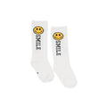 White socks with smiley face and 'smile' text on a white background